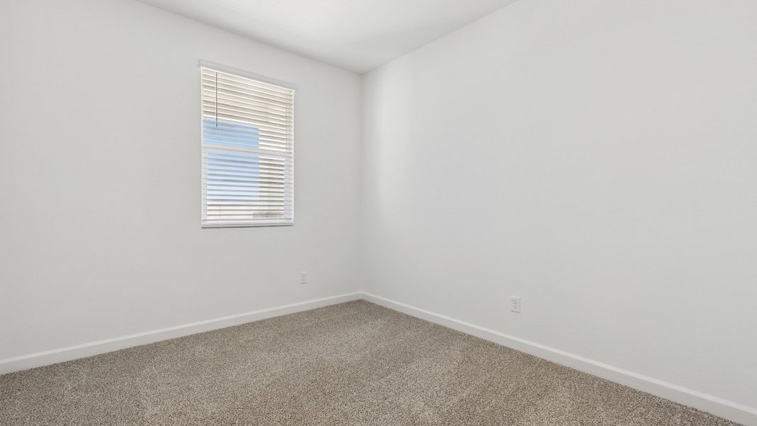 Spacious, unfurnished interior of a new home in Zanjero Pass, Waddell (Image 24).