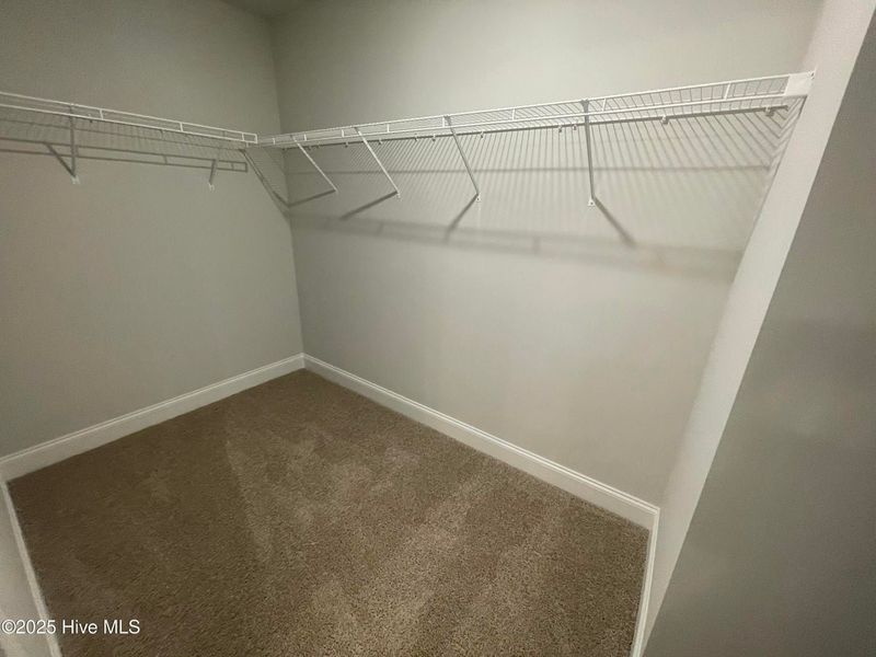 Furnished interior view inside a new home in Mill Creek Cove, Bolivia (Image 8).