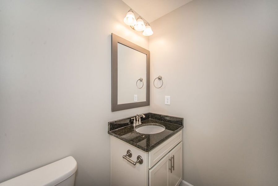 Representative furnished interior of a home built from the Pacific by Enchanted Homes in Hampshire Heights, Moore (Image 17).