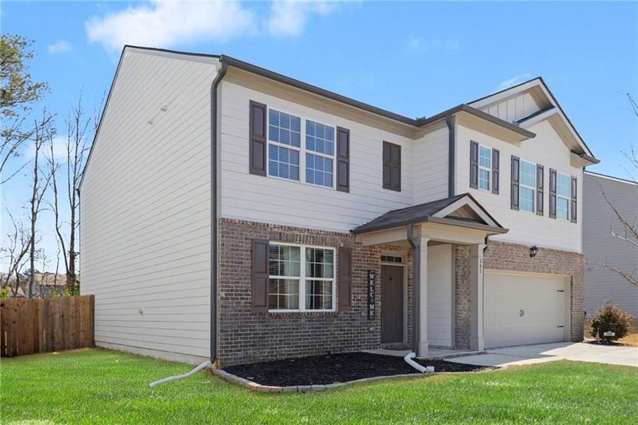Front exterior of a new home in , Dallas, GA, highlighting curb appeal (Image 27). Front exterior of a new home in , Dallas, GA, highlighting curb appeal (Image 27).