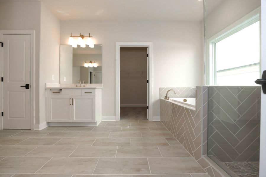 Representative furnished interior of a home built from the The Maddox by The Providence Group in Bellmoore Park, Johns Creek (Image 18).