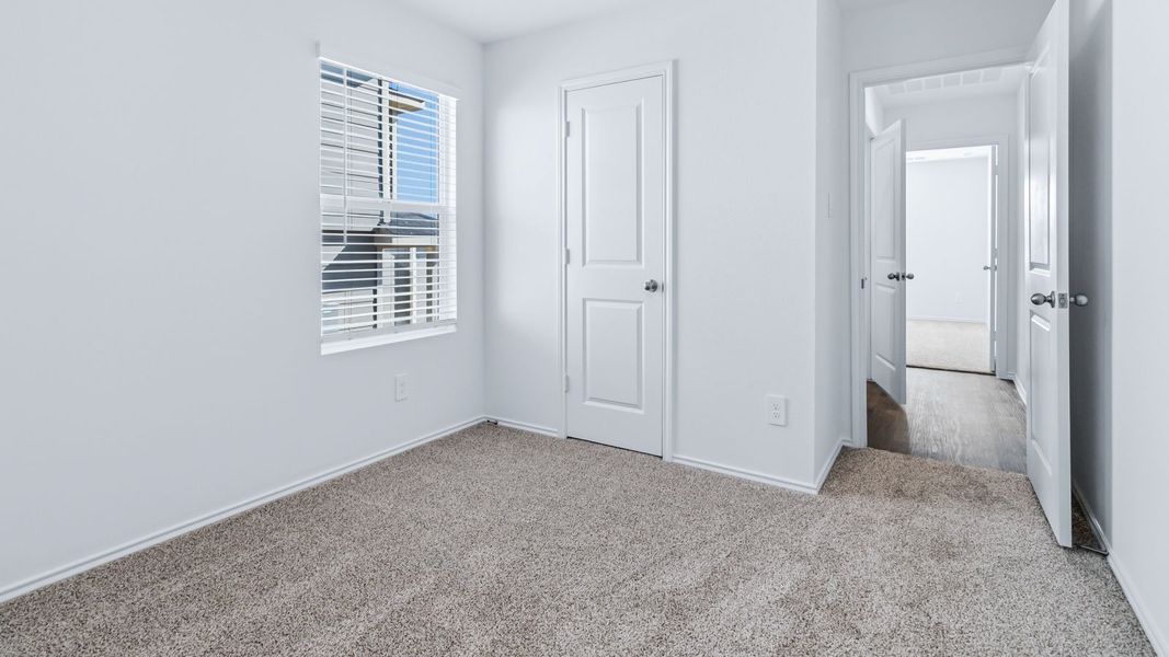 Representative unfurnished interior of a home built from the The Easton by D.R. Horton in Wayside, Uhland (Image 26).