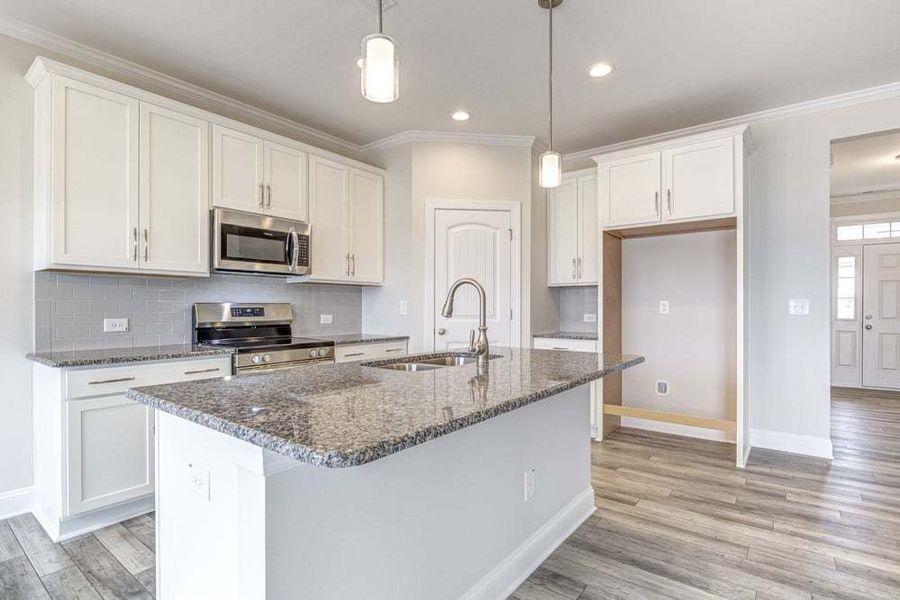 Representative furnished interior of a home built from the Pamlico by Caviness & Cates Communities in Bartlett Manor, Youngsville (Image 26).