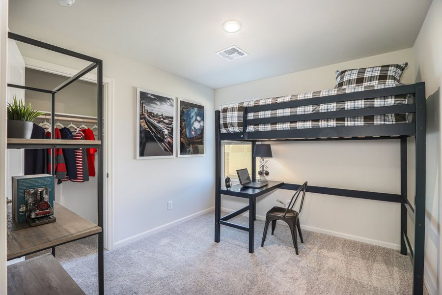 A room with a desk and a chair. A room with a desk and a chair.