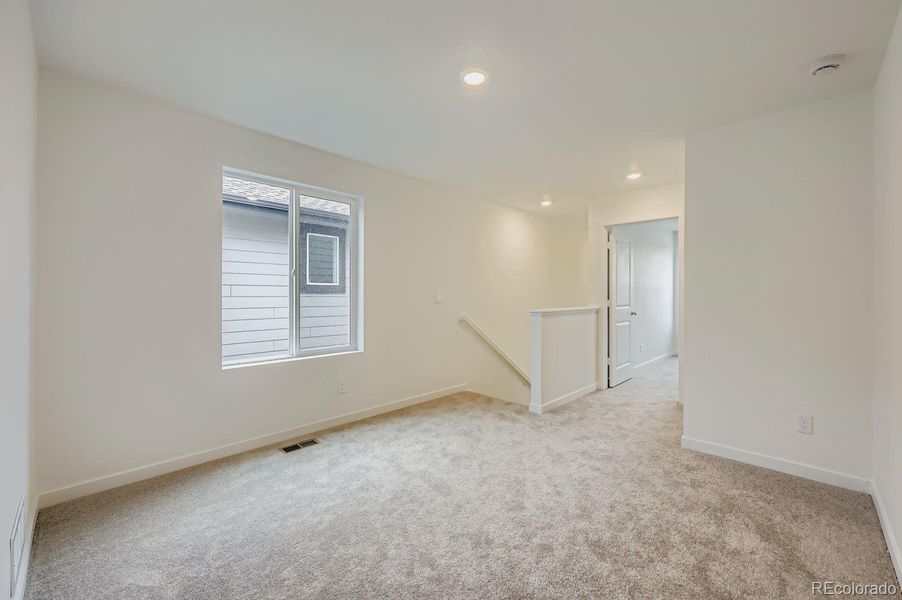 Spacious, unfurnished interior of a new home in Copper Chase: The Celestial Collection, Colorado Springs (Image 13).