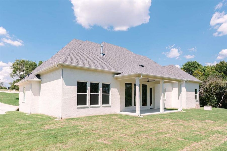 Front exterior of a new home in , Weatherford, TX, highlighting curb appeal (Image 2).