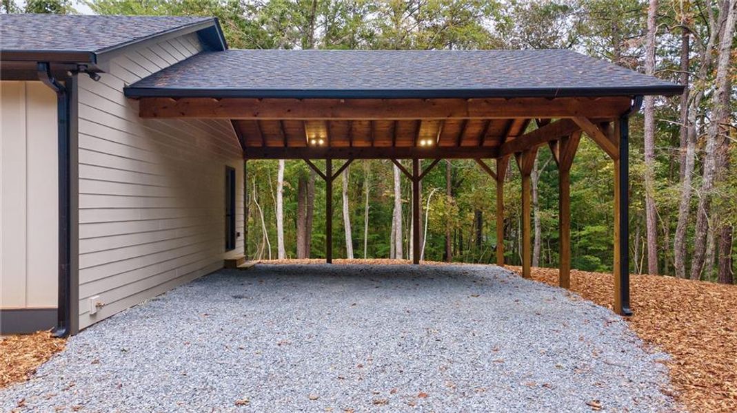 Exterior details and patio area of a home in , Ellijay (Image 30).