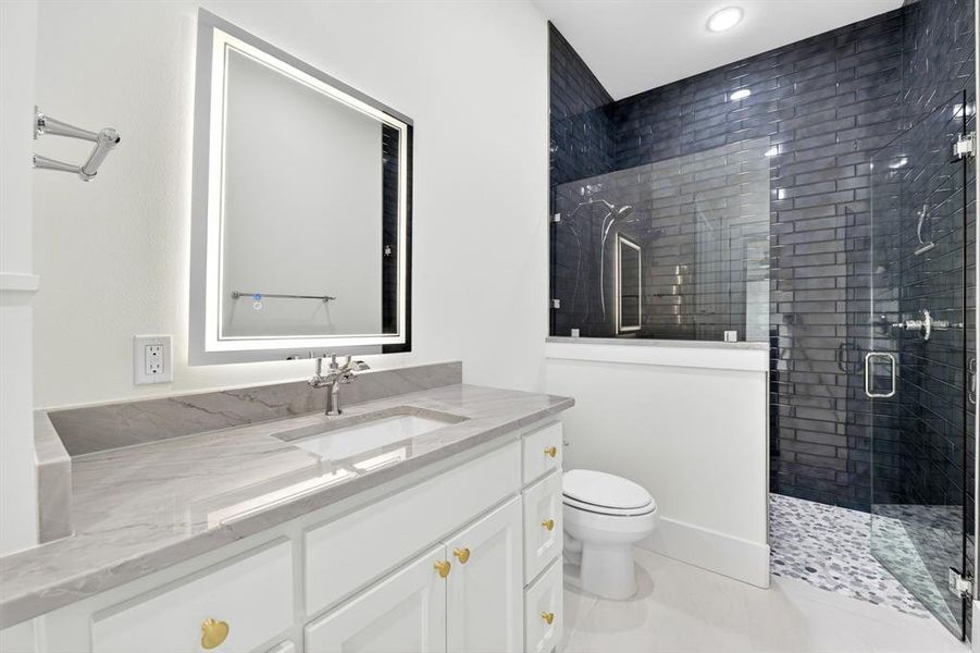 Full pool bath with access to the backyard pool area and located off the media room