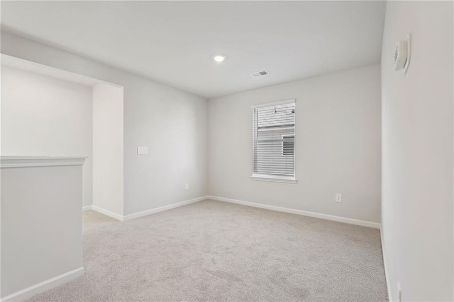 Spacious, unfurnished interior of a new home in Hawthorne Station, College Park (Image 34).