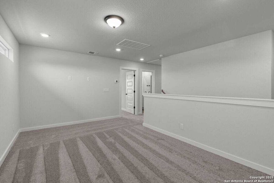 Spacious, unfurnished interior of a new home in August Fields, New Braunfels (Image 28).