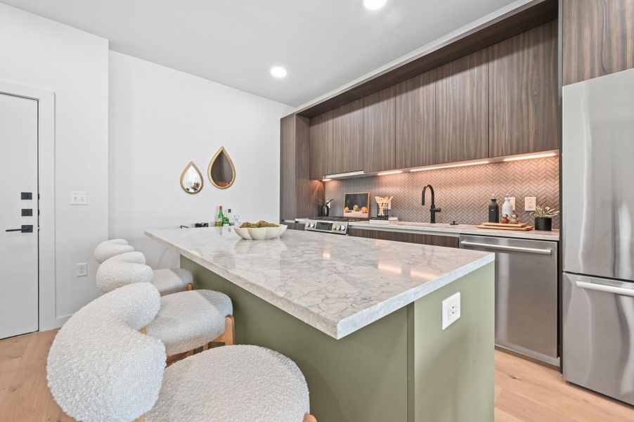 Furnished interior view inside a new home in One Oak, Austin (Image 21).