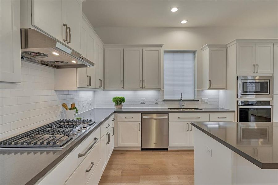 Modern elegance radiates in this kitchen with every appointment a chef will need!