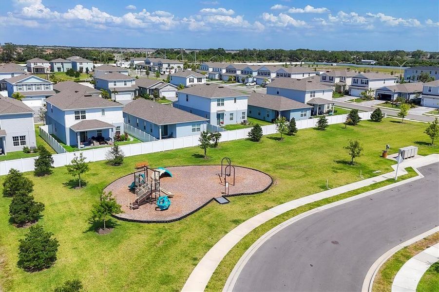Front exterior of a new home in Avalon Woods, Lakewood Ranch, FL, highlighting curb appeal (Image 24). Front exterior of a new home in Avalon Woods, Lakewood Ranch, FL, highlighting curb appeal (Image 24).