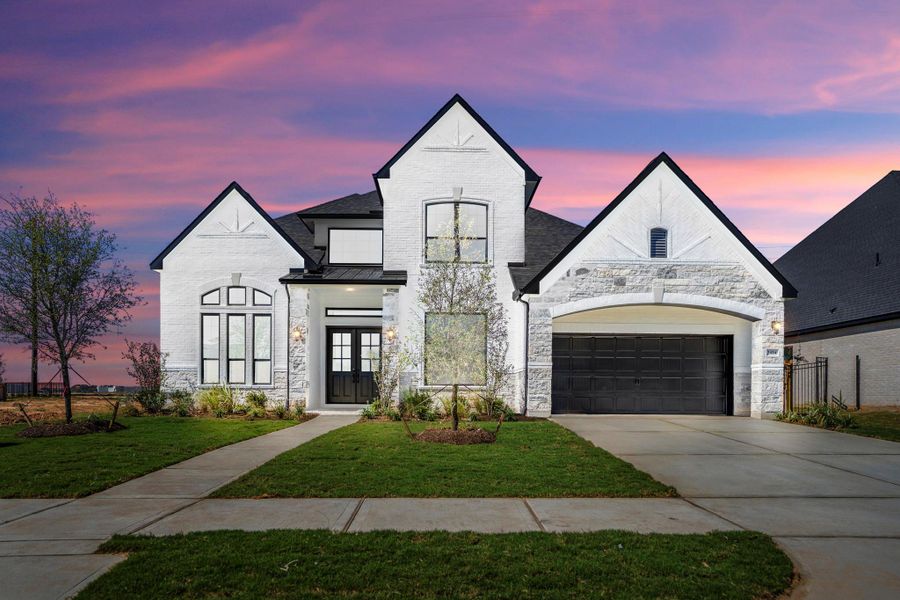 Front exterior of a new home in Jordan Ranch 70' Lots, Fulshear, TX, highlighting curb appeal (Image 25).