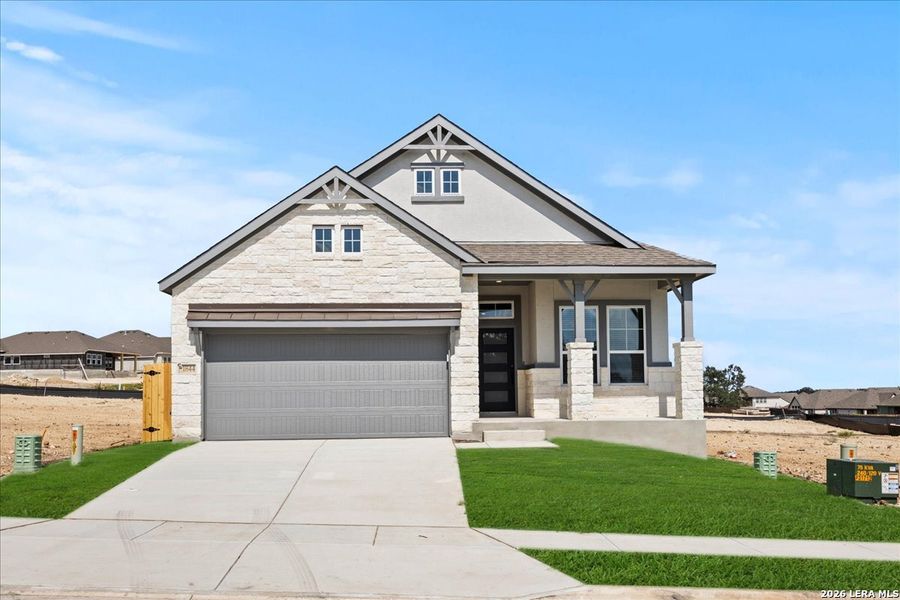 Front exterior of a new home in Meyer Ranch, New Braunfels, TX, highlighting curb appeal (Image 2). Front exterior of a new home in Meyer Ranch, New Braunfels, TX, highlighting curb appeal (Image 2).