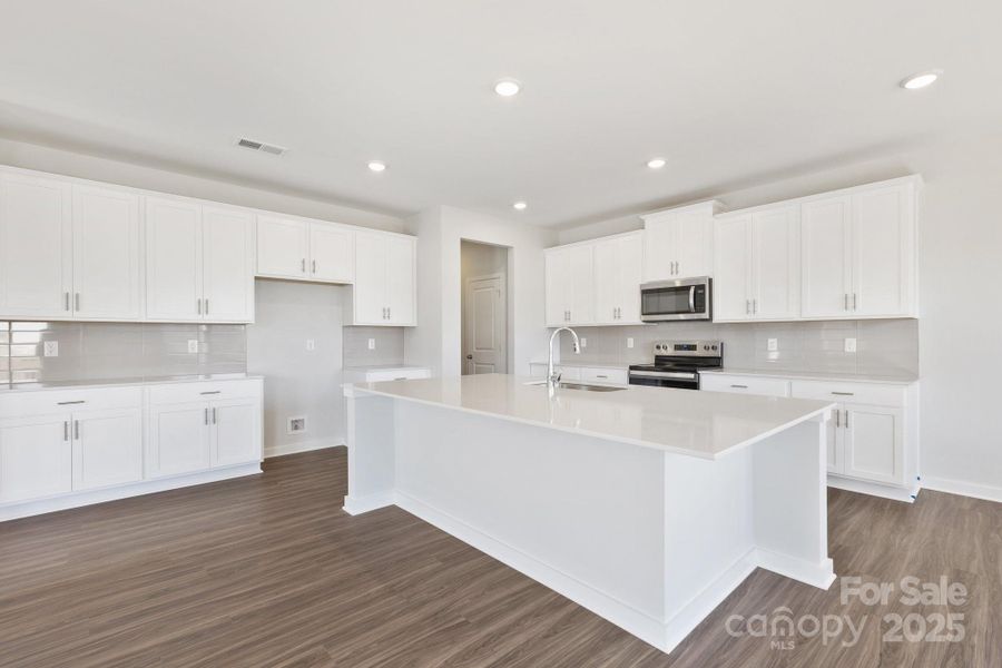 Furnished interior view inside a new home in Running Creek, Locust (Image 6).