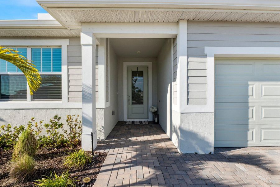 Front exterior of a new home in , Port St. Lucie, FL, highlighting curb appeal (Image 20). Front exterior of a new home in , Port St. Lucie, FL, highlighting curb appeal (Image 20).