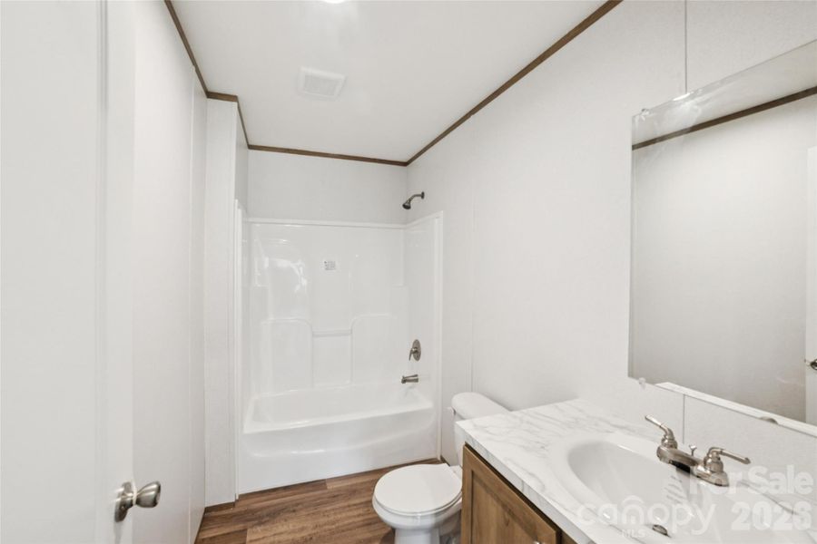 Furnished interior view inside a new home in , Vale (Image 9).