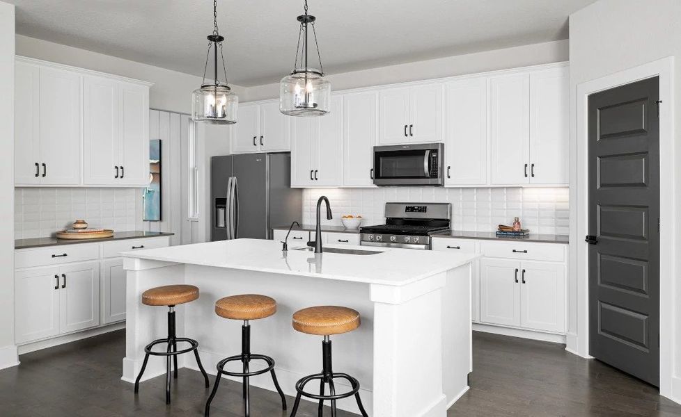 Representative furnished interior of a home built from the Blue Jay by Ashton Woods in Lariat, Liberty Hill (Image 7).