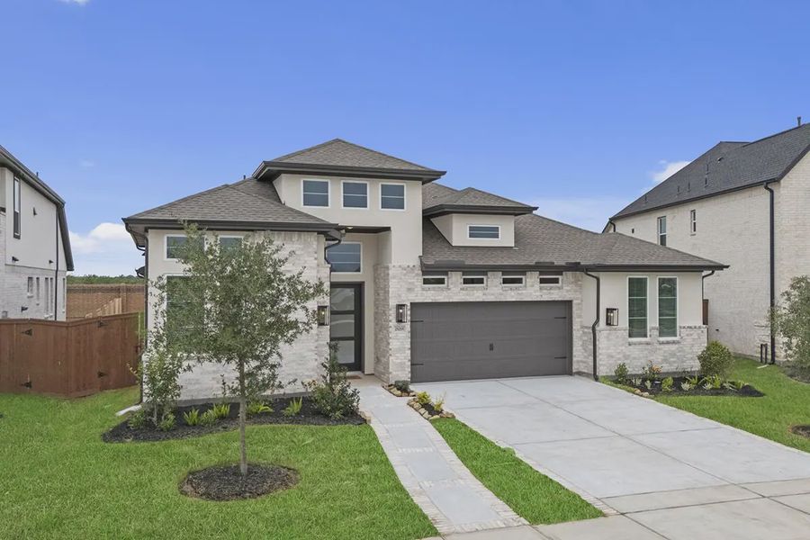 Representative exterior photo of a completed home built from the Sweetwater by Chesmar Homes in Steward Estates, Conroe, TX (Image 23). Representative exterior photo of a completed home built from the Sweetwater by Chesmar Homes in Steward Estates, Conroe, TX (Image 23).