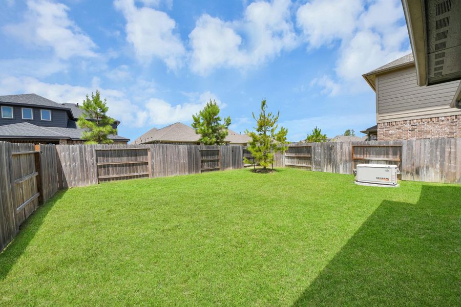 Exterior details and patio area of a home in , Conroe (Image 30).