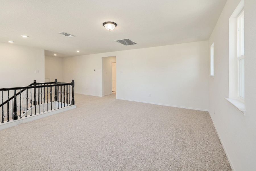 Spacious, unfurnished interior of a new home in River Bluff, Leander (Image 23).