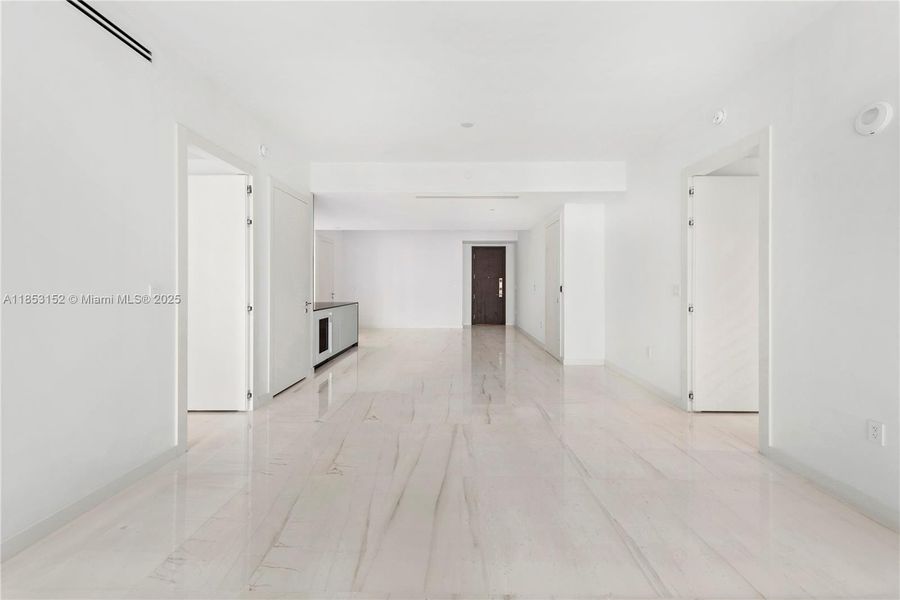 Spacious, unfurnished interior of a new home in Aston Martin Residences, Miami (Image 12).