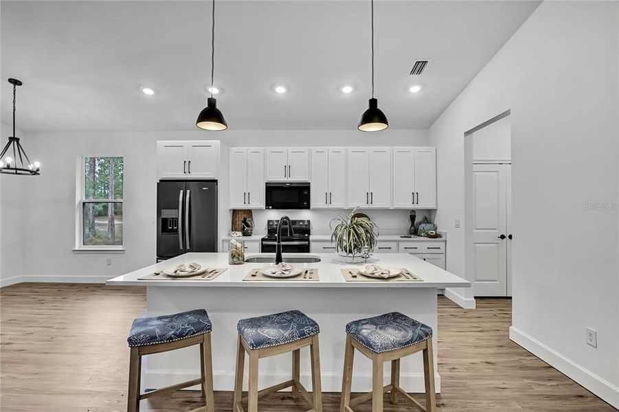 Furnished interior view inside a new home in , Weeki Wachee (Image 7).