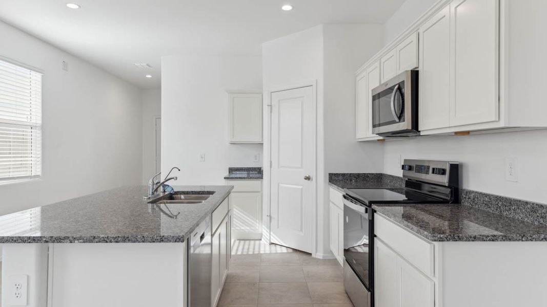 Furnished interior view inside a new home in Radiance at Superstition Vistas, Apache Junction (Image 5). Furnished interior view inside a new home in Radiance at Superstition Vistas, Apache Junction (Image 5).