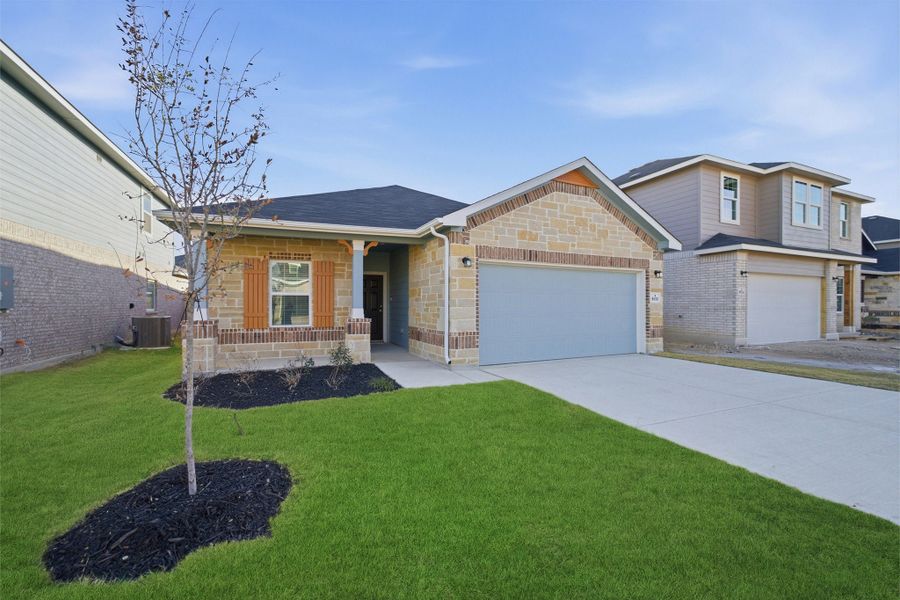 Front exterior of a new home in Notting Hill, Converse, TX, highlighting curb appeal (Image 19).