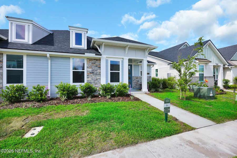 Front exterior of a new home in , Ponte Vedra, FL, highlighting curb appeal (Image 33). Front exterior of a new home in , Ponte Vedra, FL, highlighting curb appeal (Image 33).