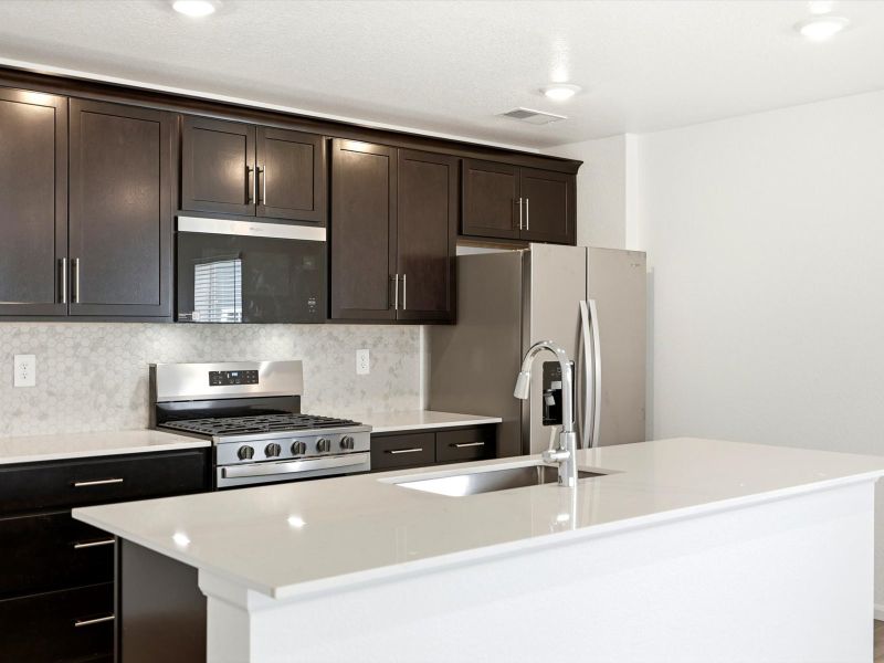 Furnished interior view inside a new home in Skyview at High Point, Aurora (Image 4).