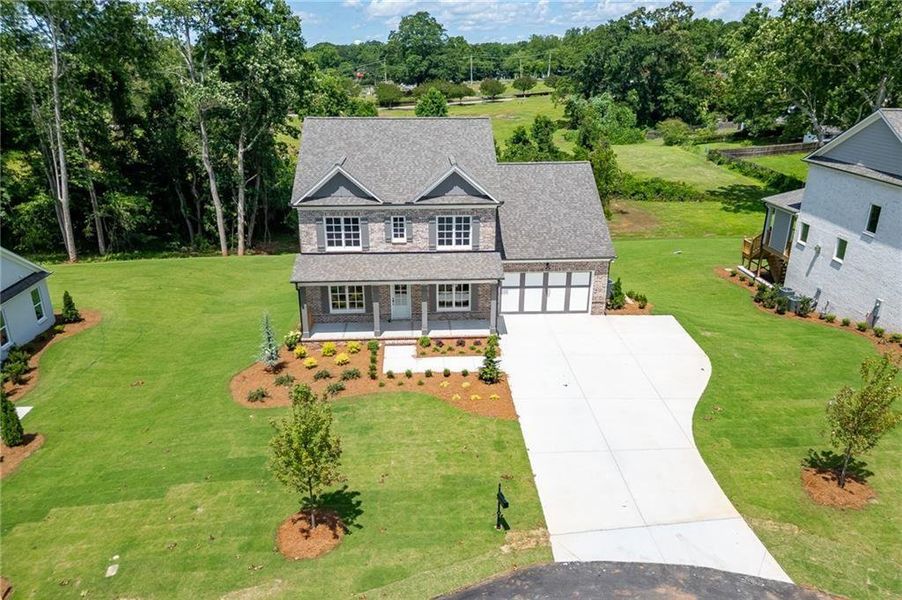 Front exterior of a new home in , Buford, GA, highlighting curb appeal (Image 28).