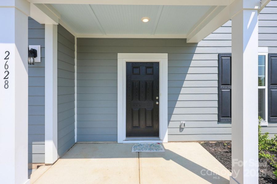 Front exterior of a new home in Piper Landing, Concord, NC, highlighting curb appeal (Image 21).