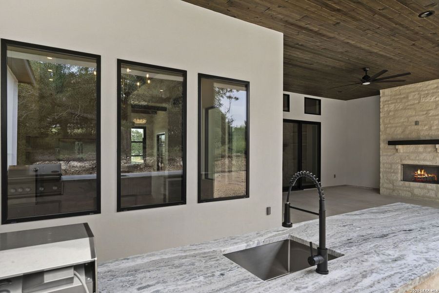 Exterior details and patio area of a home in , San Antonio (Image 37).