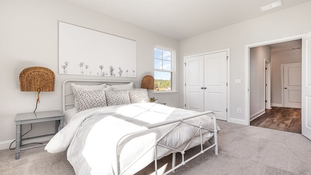 Furnished interior view inside a new home in Auberon Woods, Conway (Image 24).