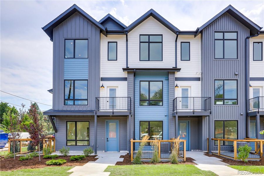 Front exterior of a new home in , Arvada, CO, highlighting curb appeal (Image 22).