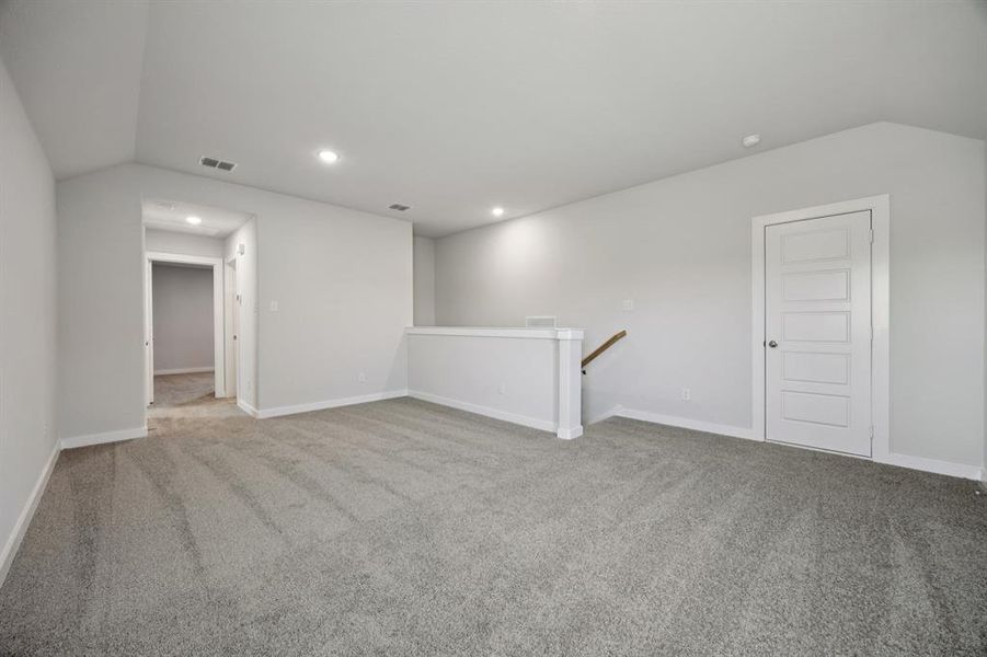 Game Room in the Haylee home plan by Trophy Signature Homes - REPRESENTATIVE PHOTO