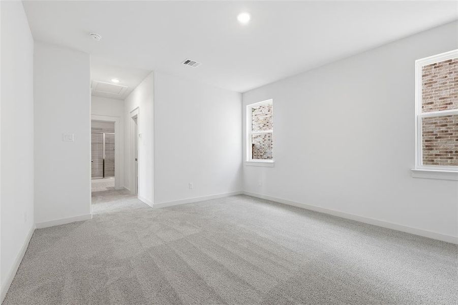 Unfurnished room with carpet, attic access, and recessed lighting Unfurnished room with carpet, attic access, and recessed lighting