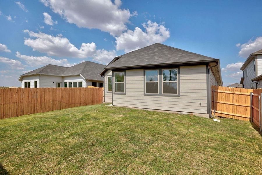 Exterior details and patio area of a home in Trinity Ranch, Elgin (Image 4). Exterior details and patio area of a home in Trinity Ranch, Elgin (Image 4).
