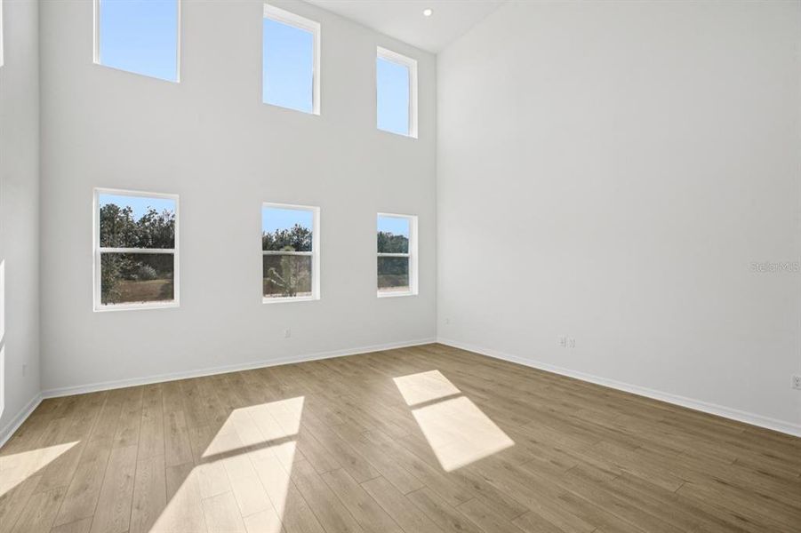 Spacious, unfurnished interior of a new home in Northlake at Ovation, Winter Garden (Image 23).