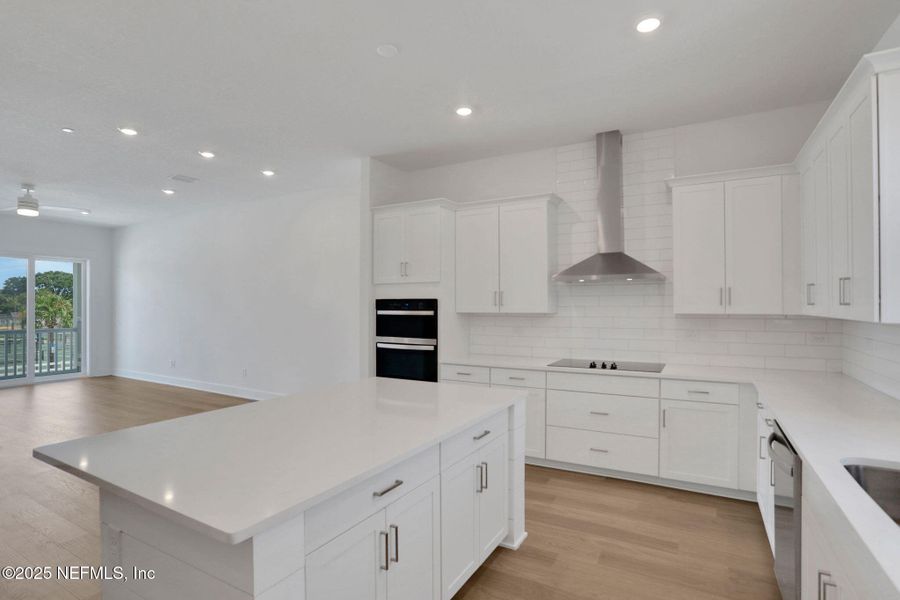 Furnished interior view inside a new home in North Beach Townhomes, Jacksonville Beach (Image 10).