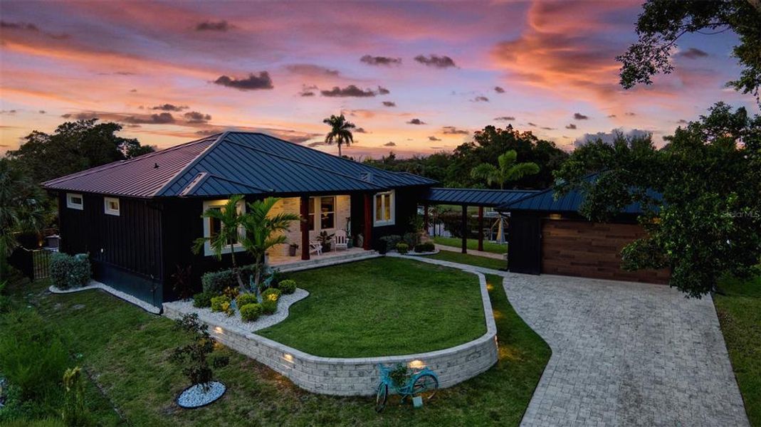 Front exterior of a new home in , Punta Gorda, FL, highlighting curb appeal (Image 22).