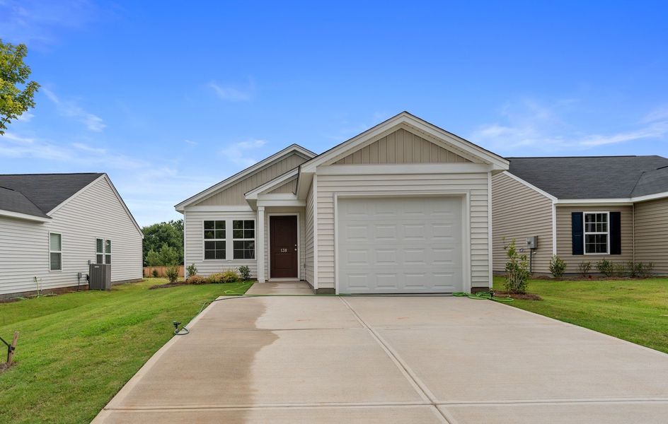 Front exterior of a new home in Evergreen, Spartanburg, SC, highlighting curb appeal (Image 1). Front exterior of a new home in Evergreen, Spartanburg, SC, highlighting curb appeal (Image 1).