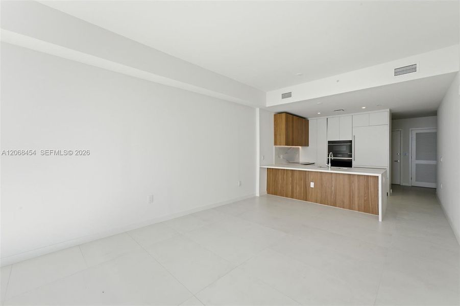 Spacious, unfurnished interior of a new home in , Miami (Image 45). Spacious, unfurnished interior of a new home in , Miami (Image 45).