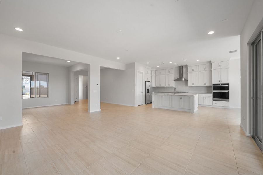 Spacious, unfurnished interior of a new home in Legado West, Queen Creek (Image 28).