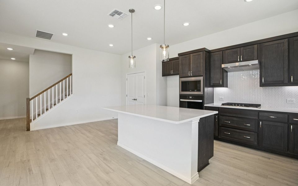 Furnished interior view inside a new home in Villas at Kissing Tree, San Marcos (Image 8).