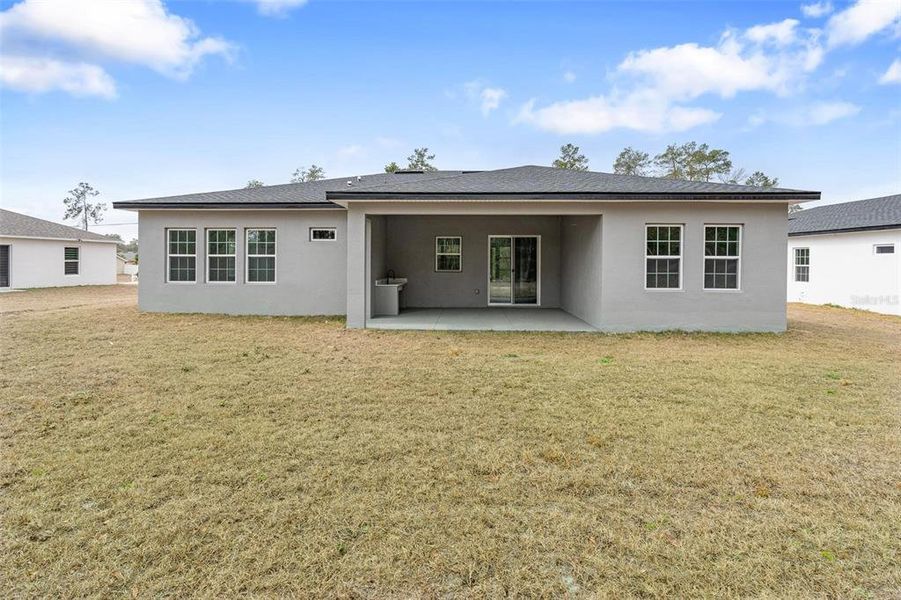 Exterior details and patio area of a home in , Ocala (Image 22).