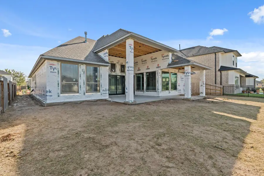 Exterior details and patio area of a home in The Park and The Reserve, Fulshear (Image 5).