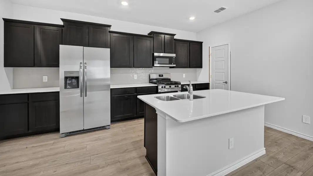 Furnished interior view inside a new home in Magnolia at Legacy Hills, Celina (Image 3).